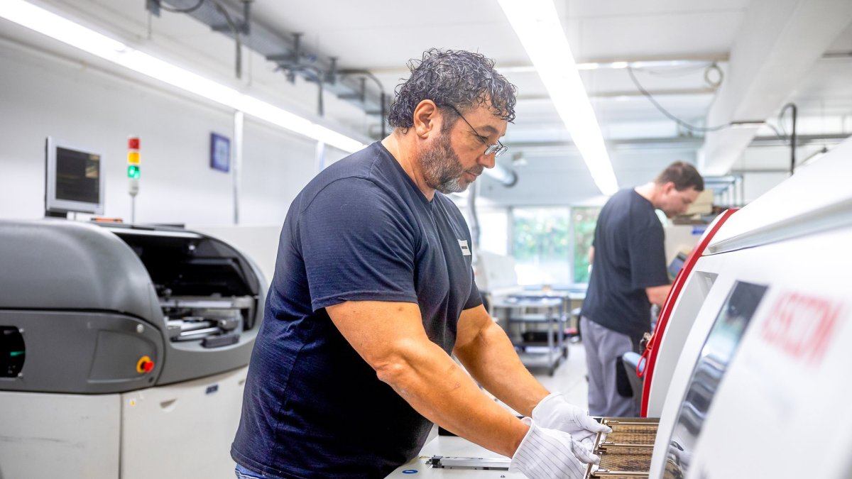 Employee at the SMD assembly line